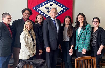 Staff from Alaska LEND vist with representative a their Arkansas office.